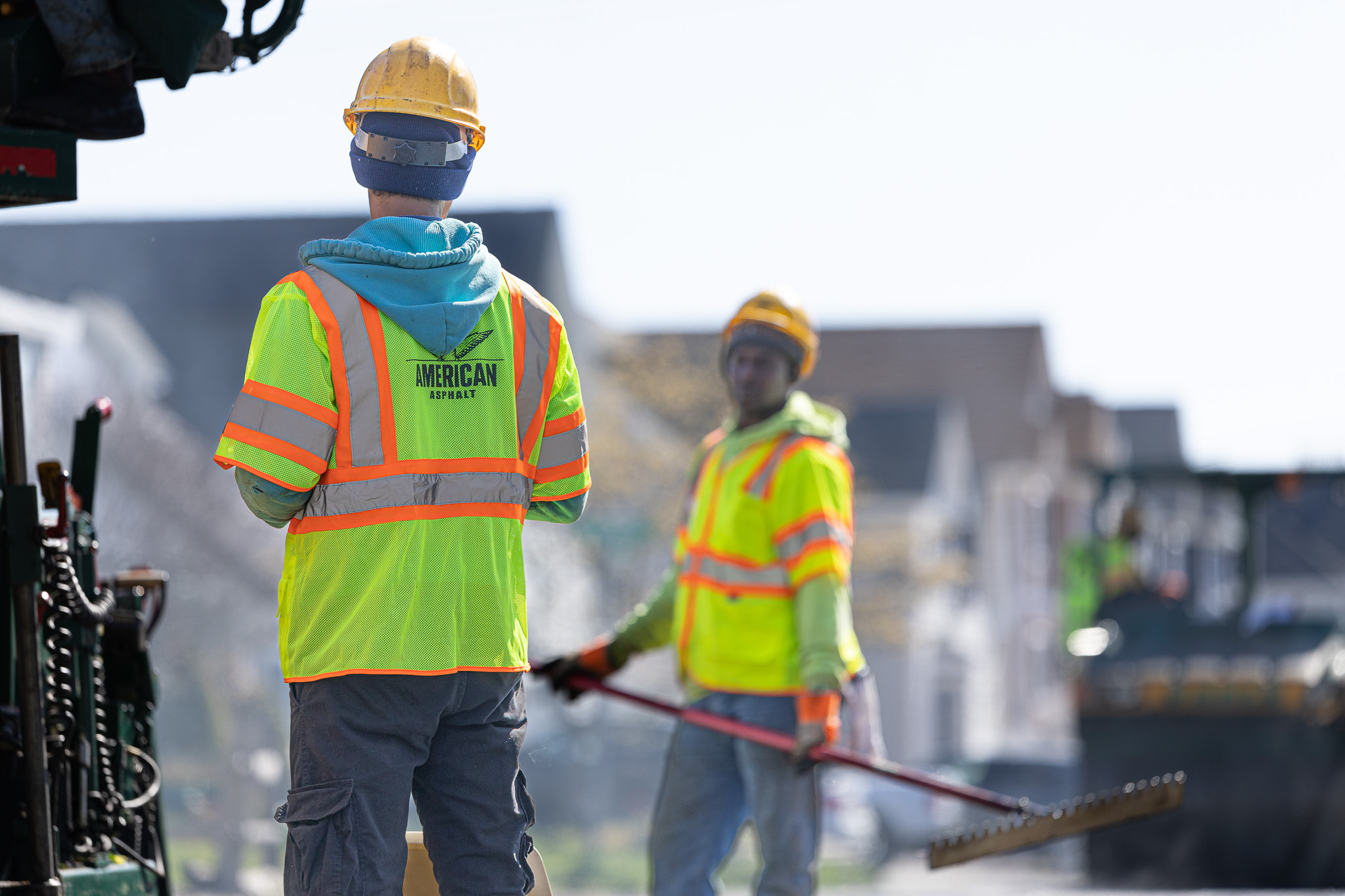 American Asphalt team members hard at work with asphalt maintenance